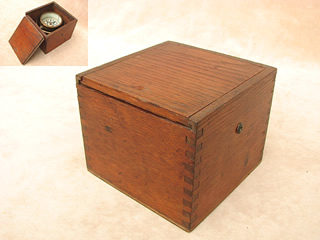 Top view of 19th century ships gimbal mounted compass in oak box